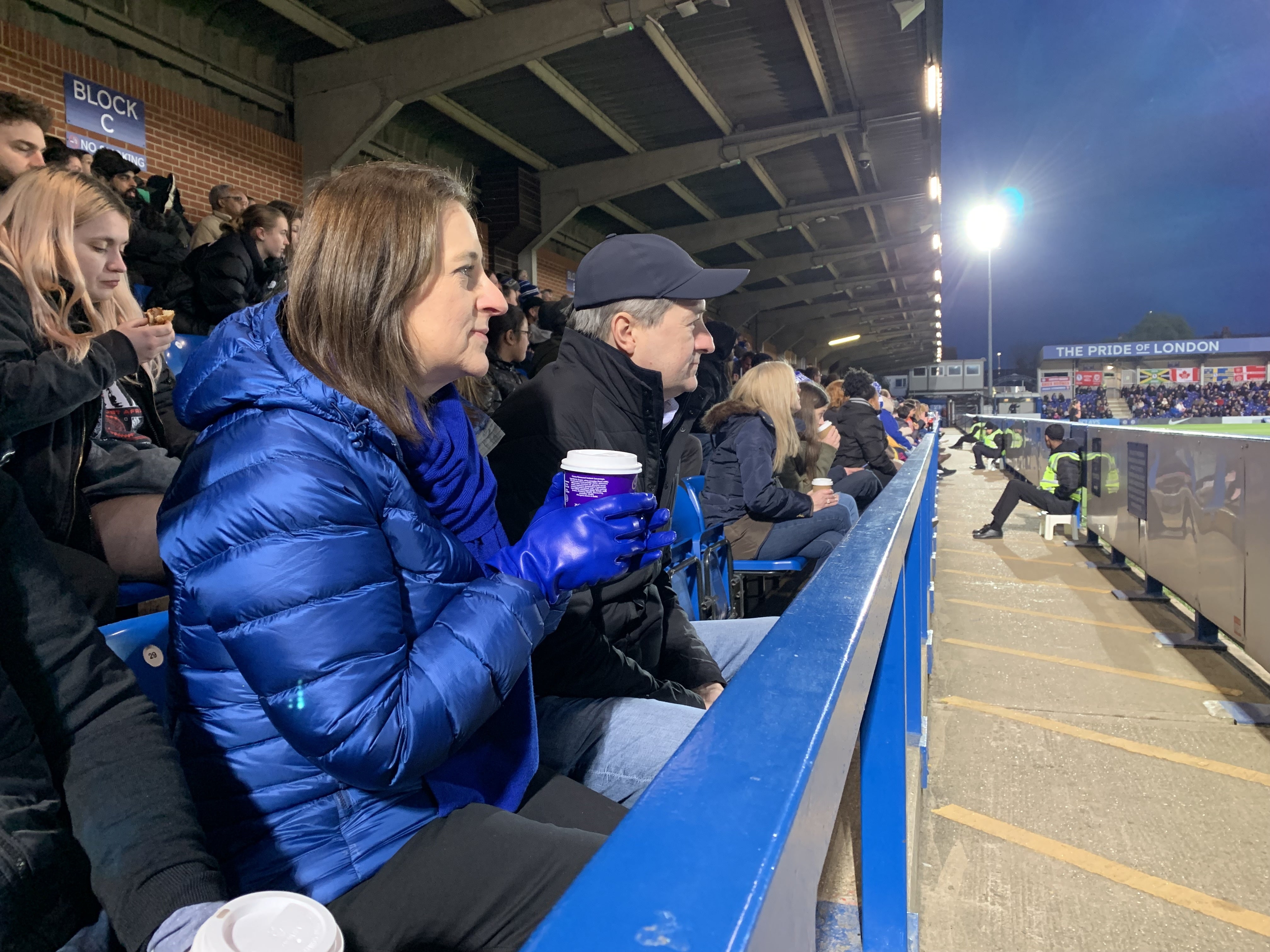 Laura and Tom Ricketts watching a Chelsea Women’s Super League game (PA)