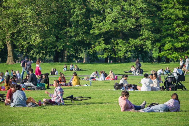 <p>Britons can look forward to the “warmest day of the year so far” tomorrow on the first day of the bank holiday weekend </p>