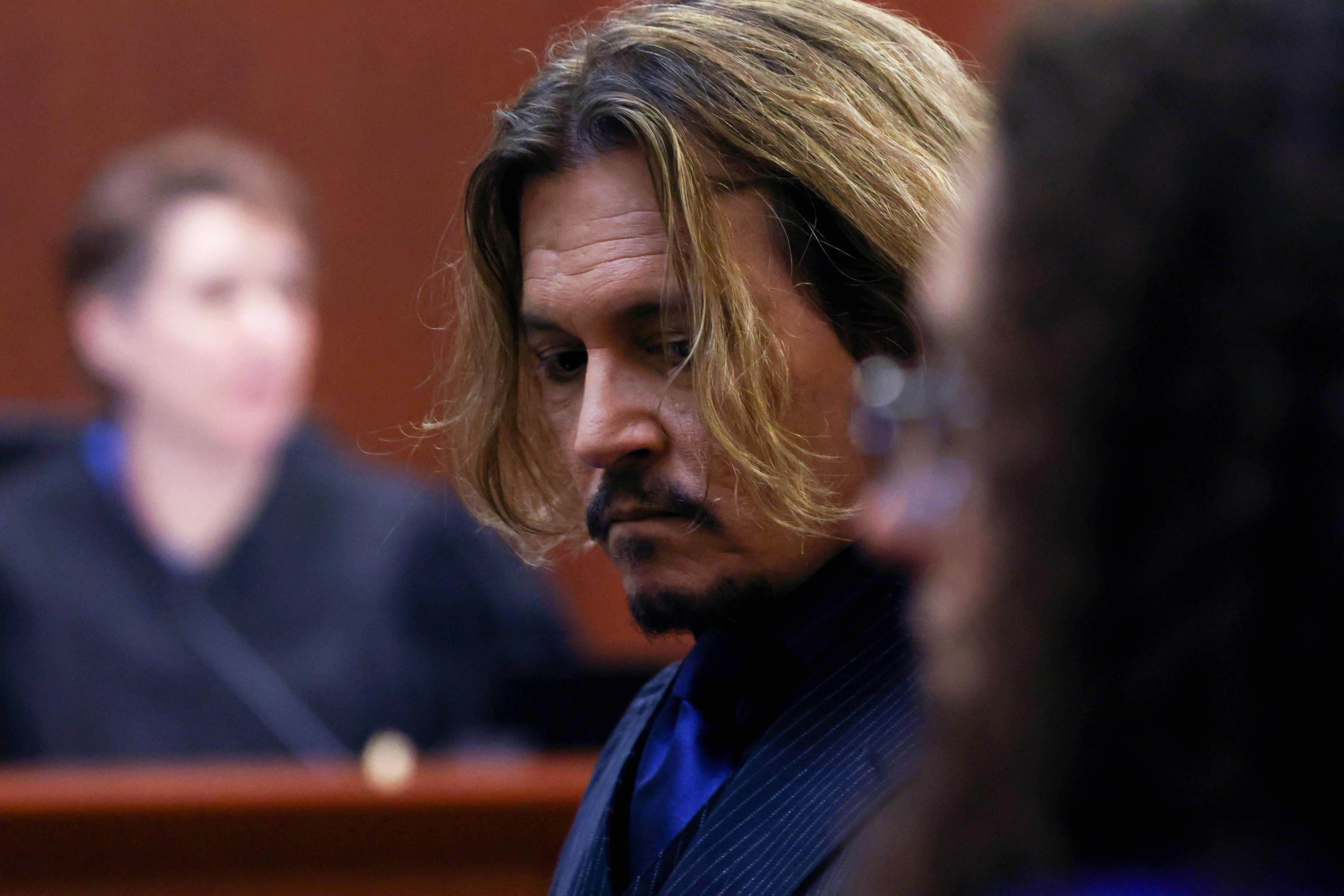 Depp sits in court on 13 April