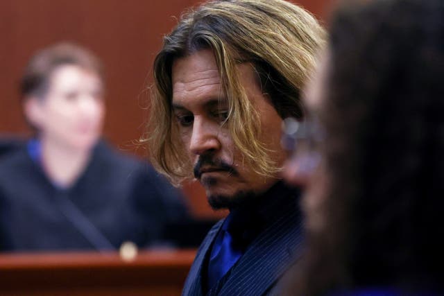 <p>Depp sits in court on 13 April </p>