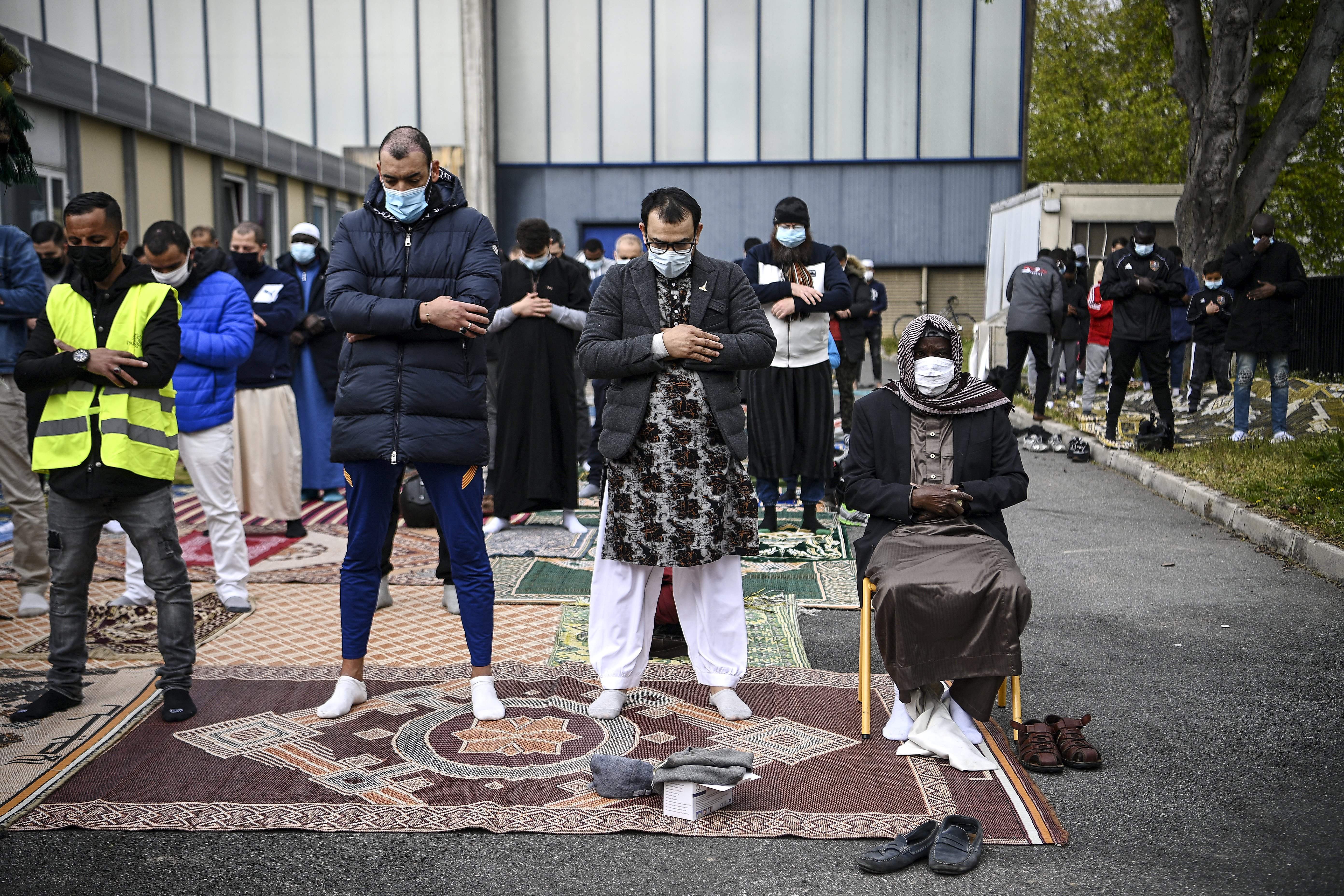 Muslim worshippers pray at the Grande Mosquee de Pantin, northern Paris