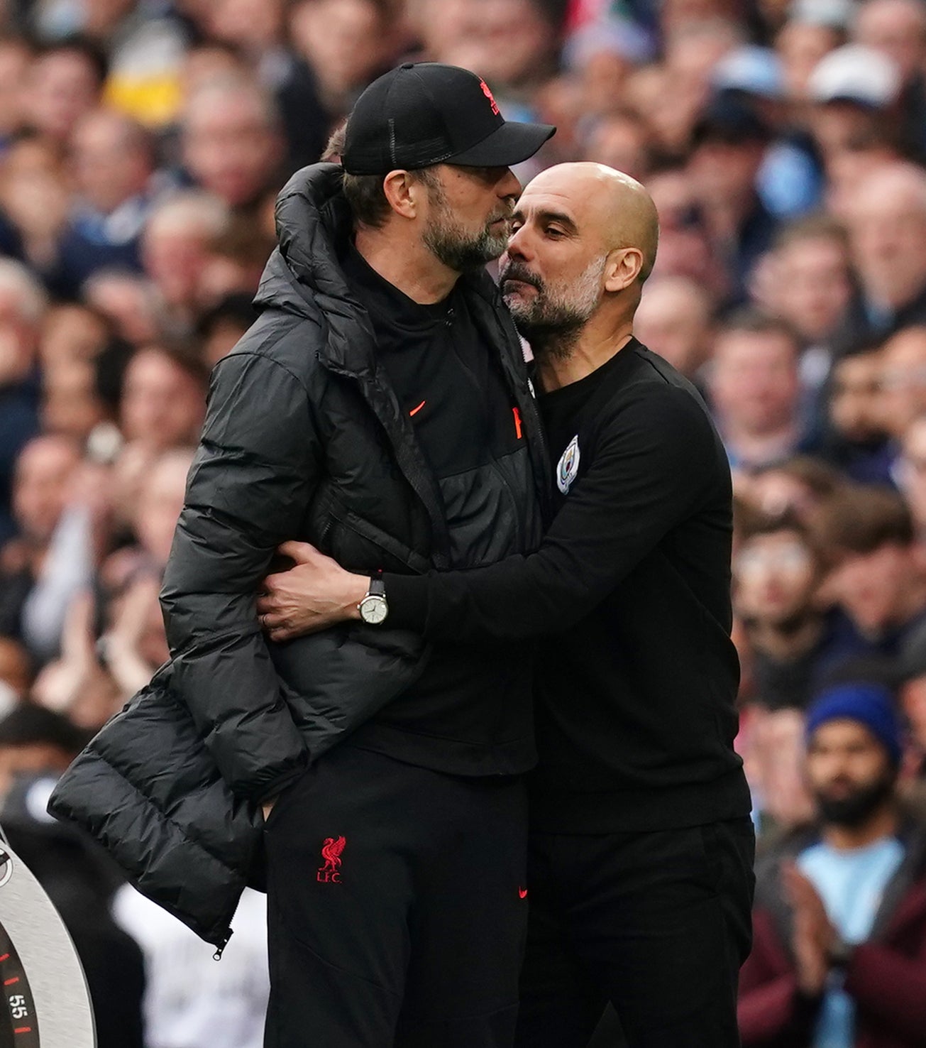 Pep Guardiola (right) and Jurgen Klopp are hoping for multiple honours this season (Martin Rickett/PA)