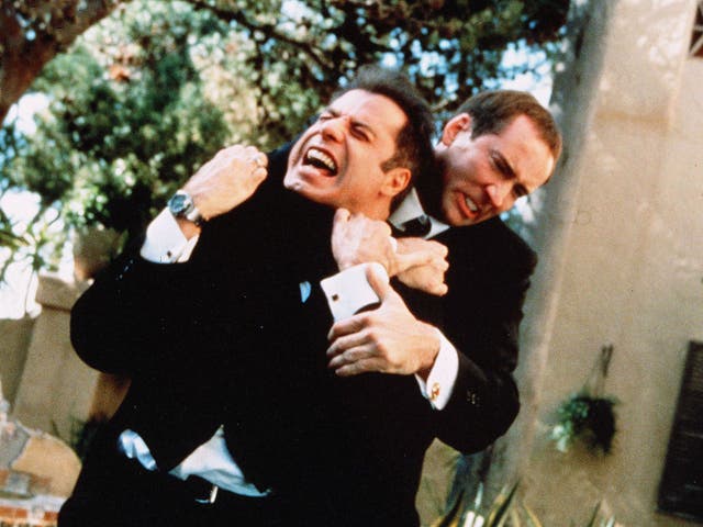 <p>John Travolta and Nicolas Cage in the 1997 action film ‘Face/Off'</p>