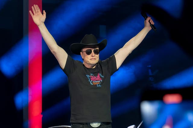 CEO of Tesla Motors Elon Musk speaks at the Tesla Giga Texas manufacturing "Cyber Rodeo" grand opening party in Austin, Texas, on April 7, 2022