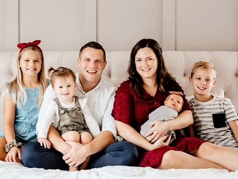 Kirsten Bridegan, Jared Bridegan, and children in family picture before he was shot dead in Jacksonville Beach