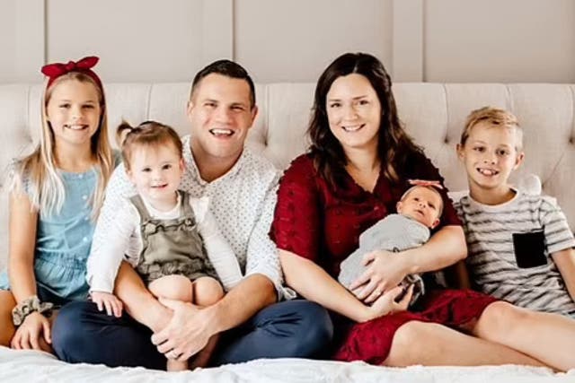 <p>Jared Bridegan pictured with second wife, Kristen Bridegan, and children </p>