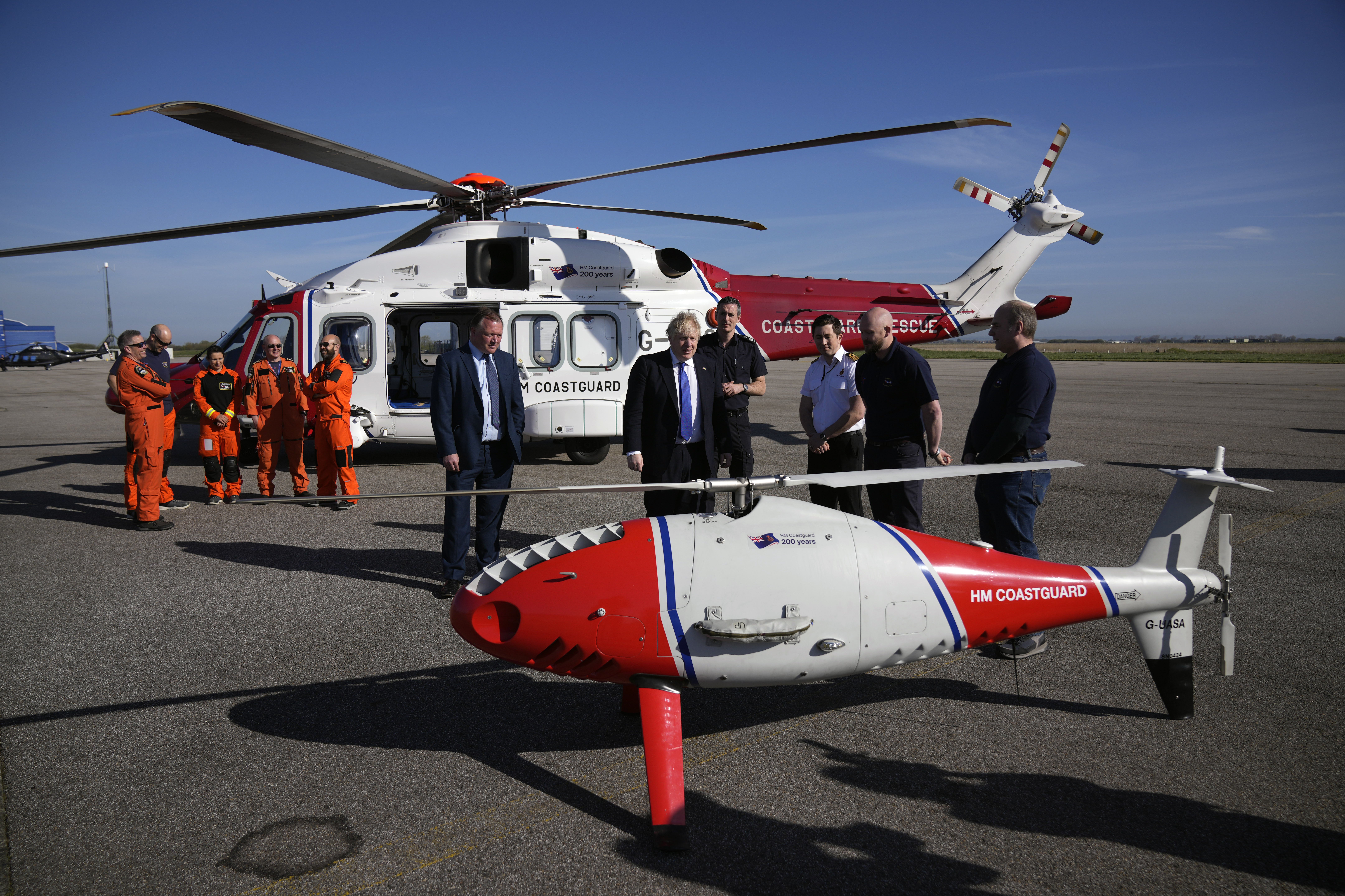 Boris Johnson is shown a Coastguard drone for surveillance and rescue of migrants (Matt Dunham/PA)