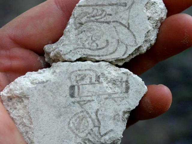 <p>Two mural fragments dating back to between 200 and 300 BC bear evidence for the earliest use of the Maya calendar</p>