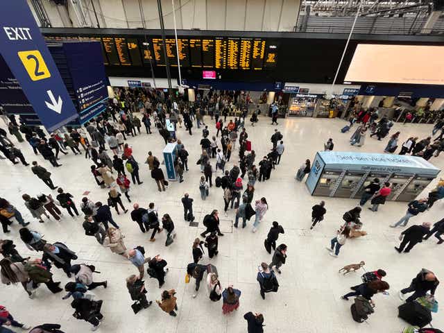 <p>Going places? The UK’s busiest railway station, London Waterloo, on Maundy Thursday</p>