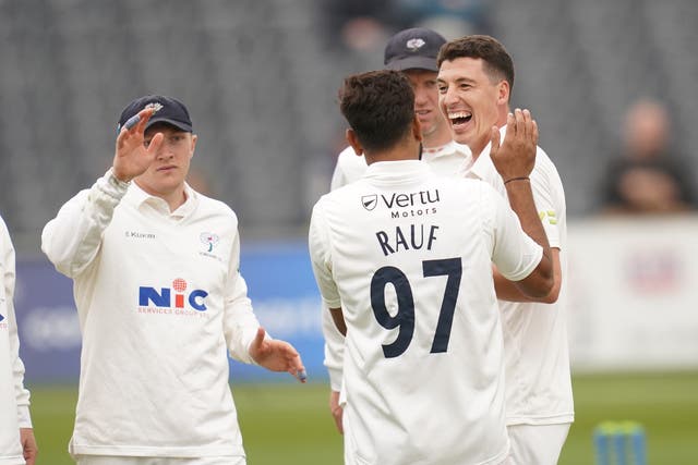Yorkshire’s Matthew Fisher (right) celebrates one of his first four wickets against Gloucestershire (David Davies/PA)