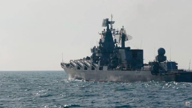 <p> A handout still image taken from a video footageshows Russian Navy missile cruiser ‘Moskva’ participating in exercise in the Black Sea off the coast of Crimea, 18 February 2022</p>