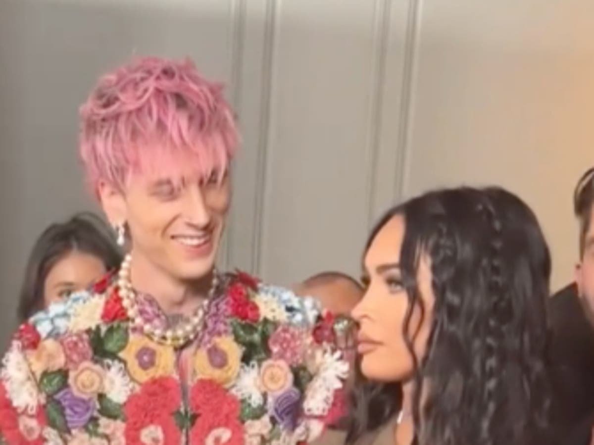 New video sees Megan Fox awkwardly shunning kiss from Machine Gun Kelly on red carpet