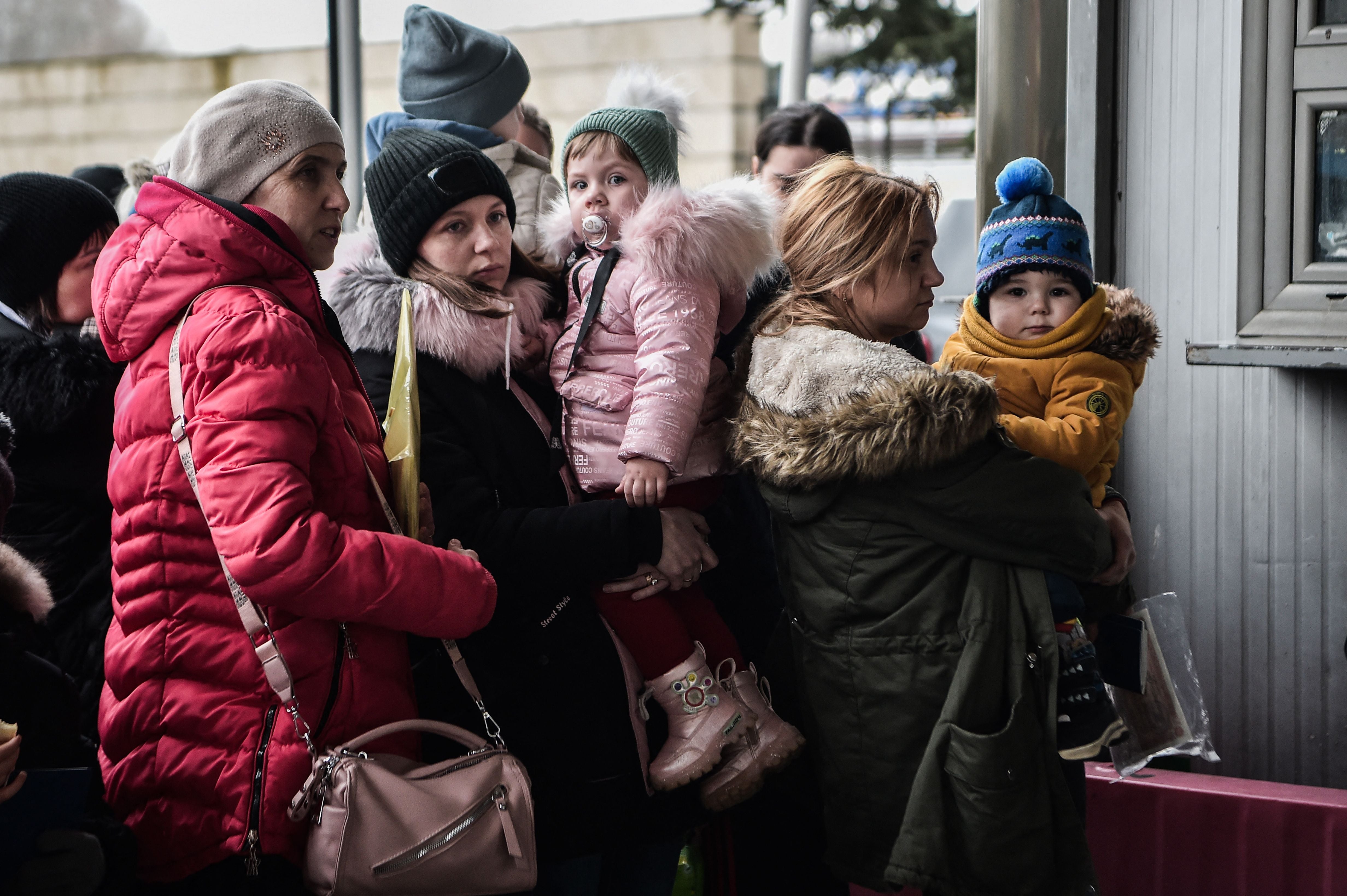 Ukrainian refugees arrive by bus at the Greece-Bulgarian border in northern Greece