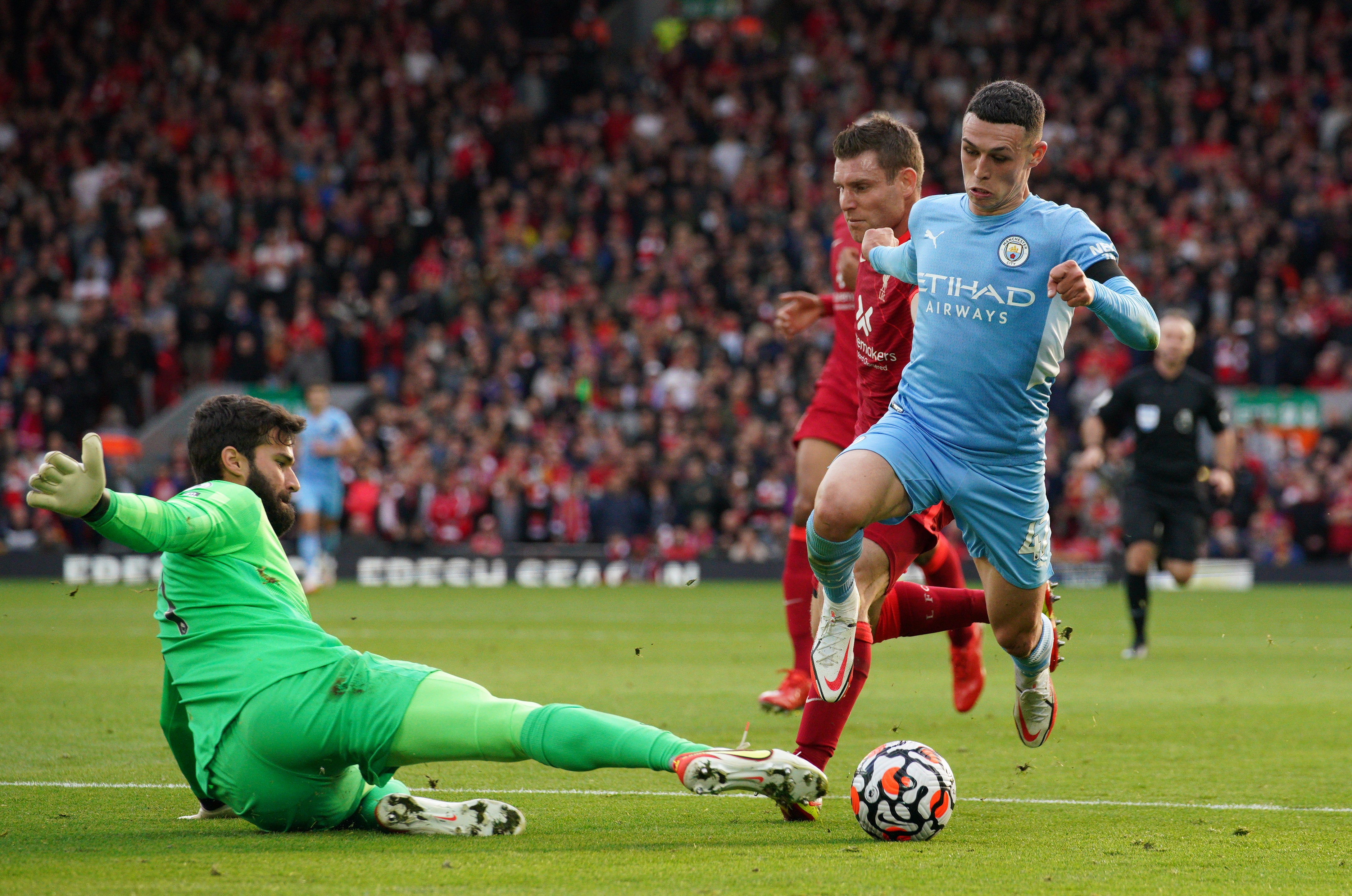Liverpool goalkeeper Alisson Becker has already played a crucial part against Manchester City this season (Peter Byrne/PA)