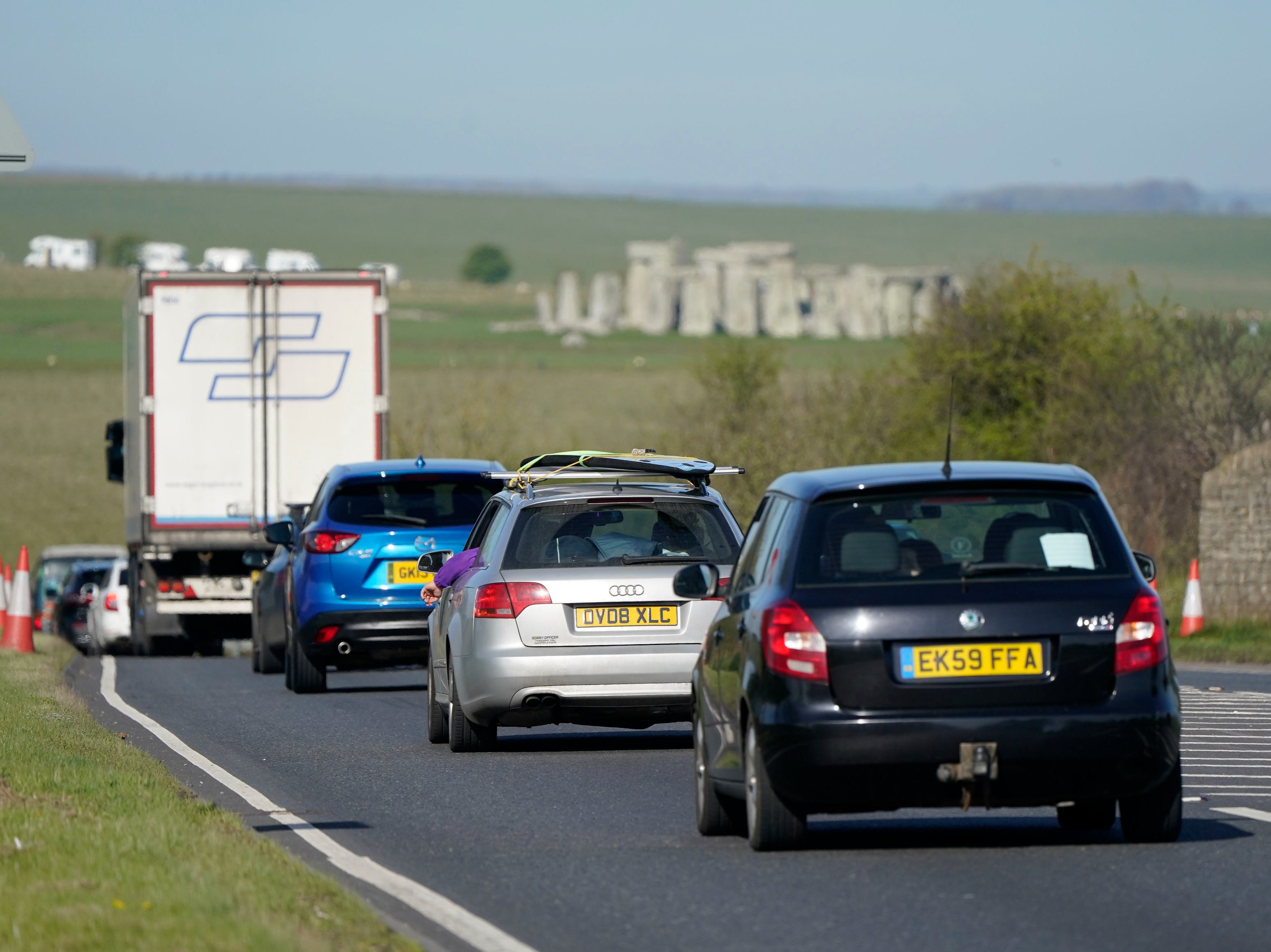 Cars make their way along the A303 past Stonehenge in Wiltshire during the Easter getaway