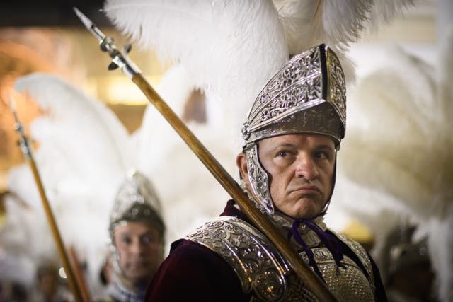 <p>A centurian during the Macarena Centuria procession in Seville on Friday </p>