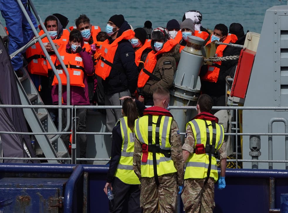 A group of people thought to be migrants are brought in to Dover (Gareth Fuller/PA)