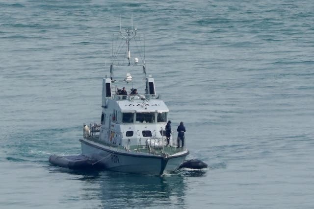 Royal Navy HMS Blazer tows two small boats as it arrives in Dover, Kent, following a number of small boat incidents in the Channel. Boris Johnson has put the Navy in command of the English Channel, as he defended plans to send some asylum seekers who make the crossing in small boats to Rwanda. Picture date: Thursday April 14, 2022.
