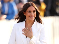 Meghan Markle makes first appearance at Invictus Games in all-white suit to joy from fans