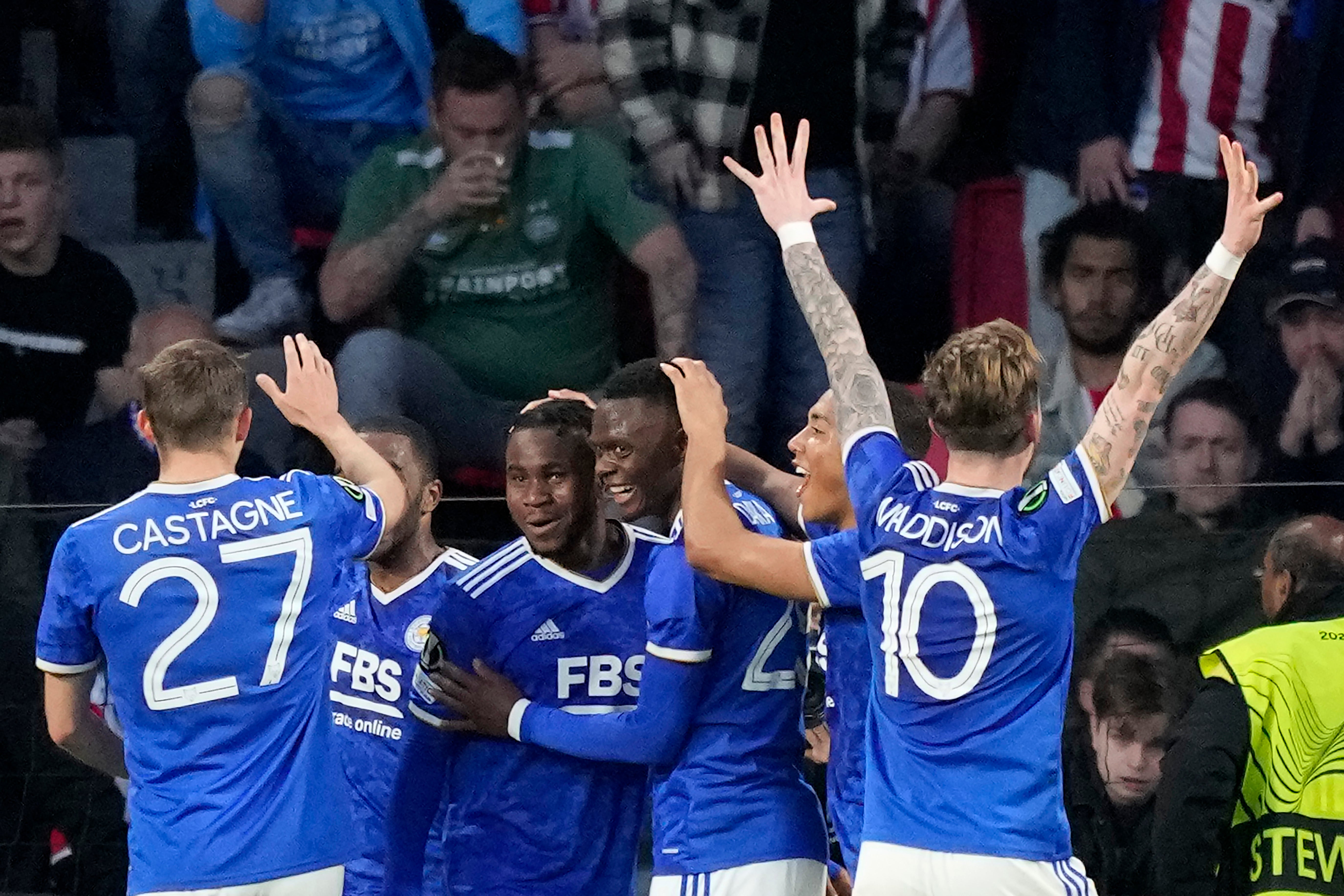 James Maddison (right) celebrates with his Leicester team-mates in Eindhoven (Peter Dejong/AP)
