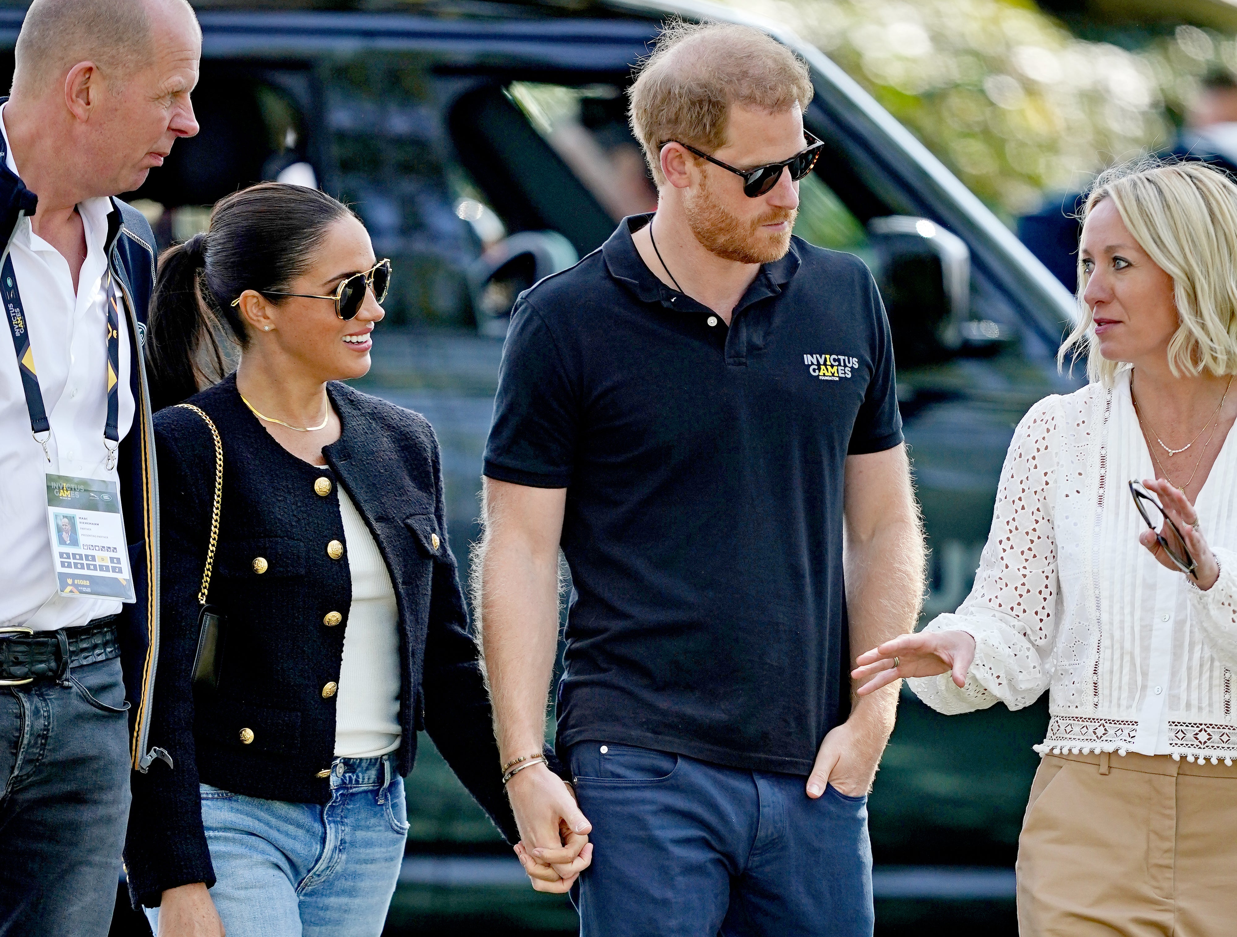Meghan and Harry hold hands (Aaron Chown/PA)