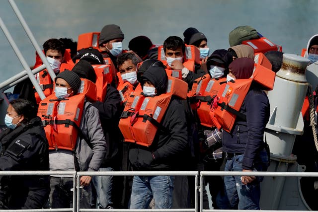 A group of people thought to be migrants are brought in to Dover, Kent (Gareth Fuller/PA)