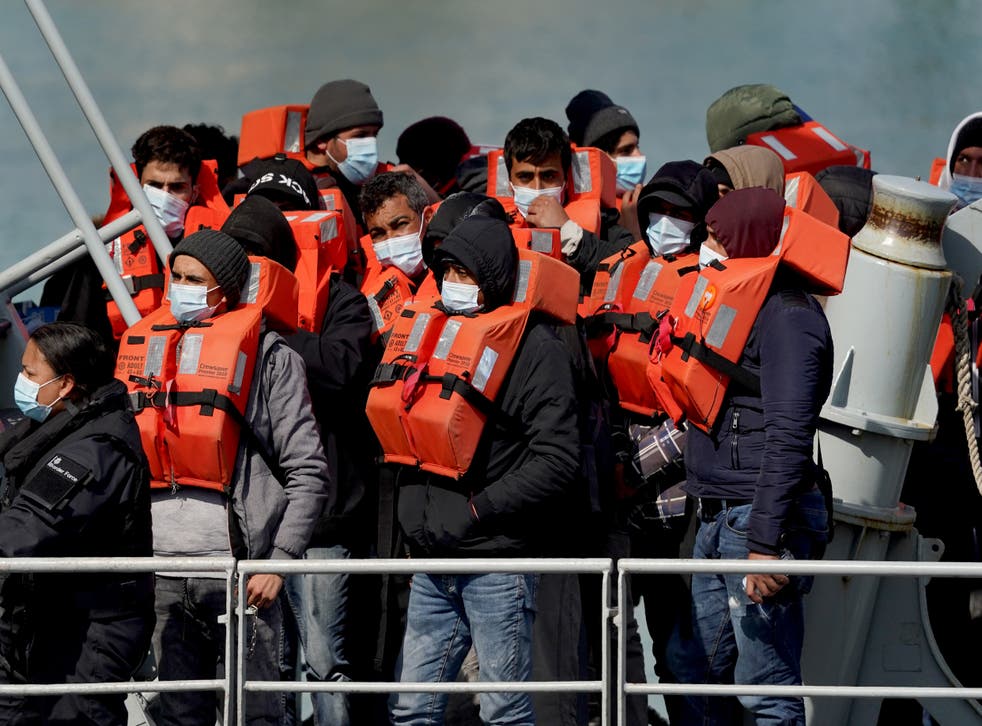 A group of people thought to be migrants are brought in to Dover, Kent (Gareth Fuller/PA)