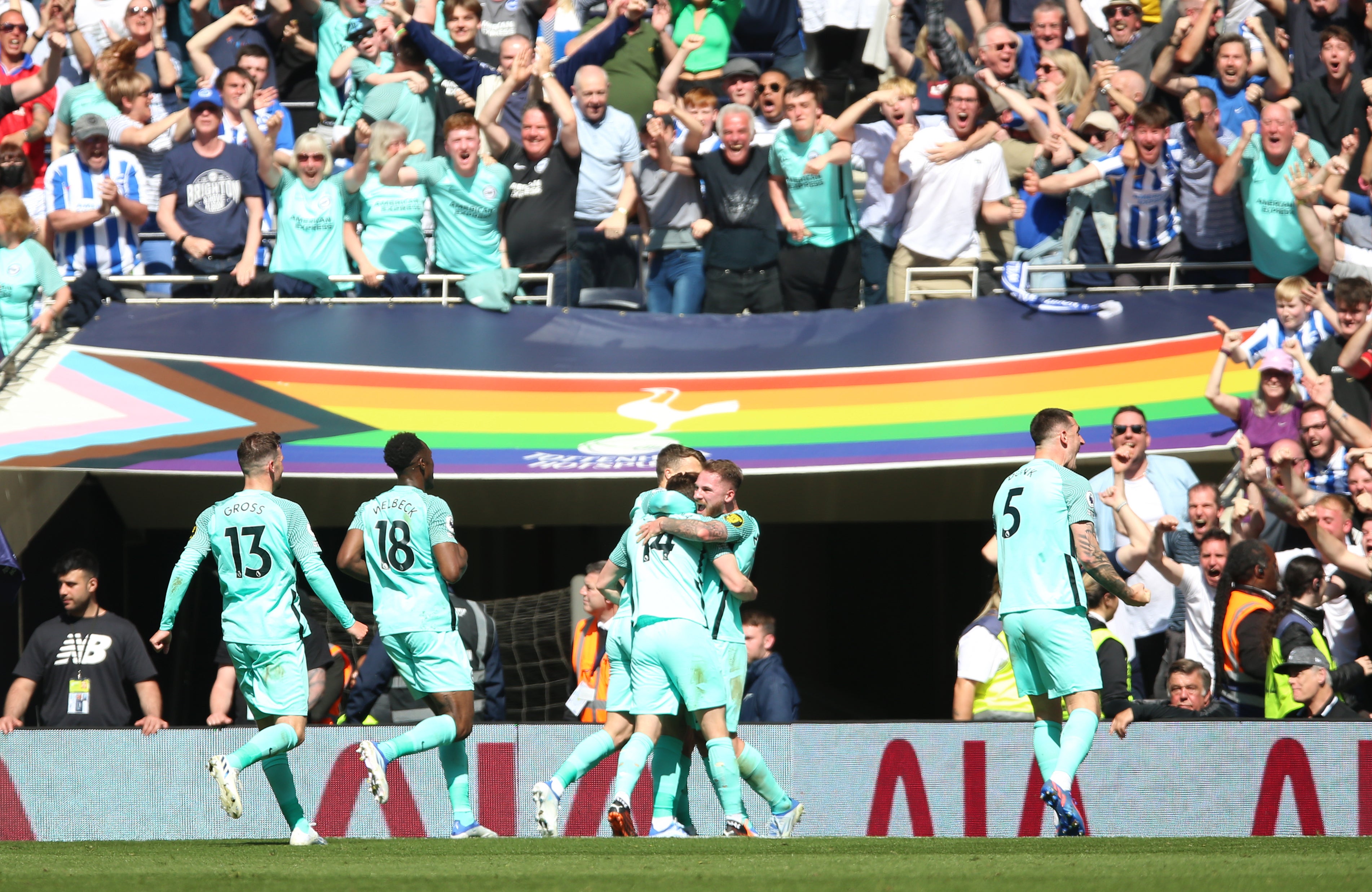 Brighton celebrate after Leandro Trossard scored their dramatic late winner against Tottenham