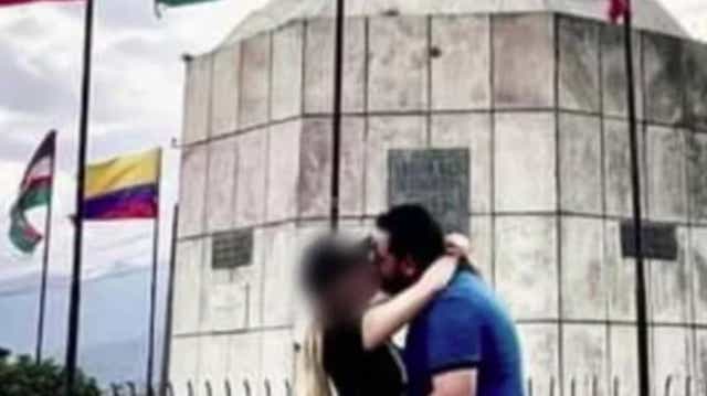 <p>Brian Donaciano Olguín, an alleged Sinaloa drug trafficker known as “El Pitt”, kisses an unknown woman in Cali, Colombia</p>