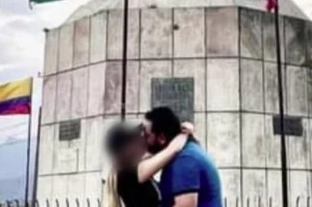 <p>Brian Donaciano Olguín, an alleged Sinaloa drug trafficker known as “El Pitt”, kisses an unknown woman in Cali, Colombia</p>