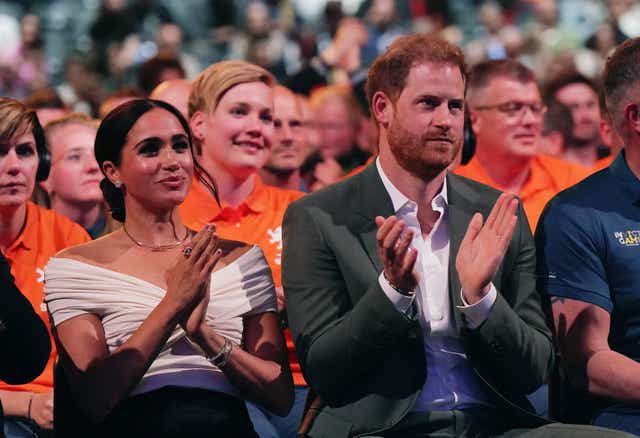The Duke and Duchess of Sussex watch the Invictus Games opening ceremony at Zuiderpark the Hague, Netherlands. Picture date: Saturday April 16, 2022.