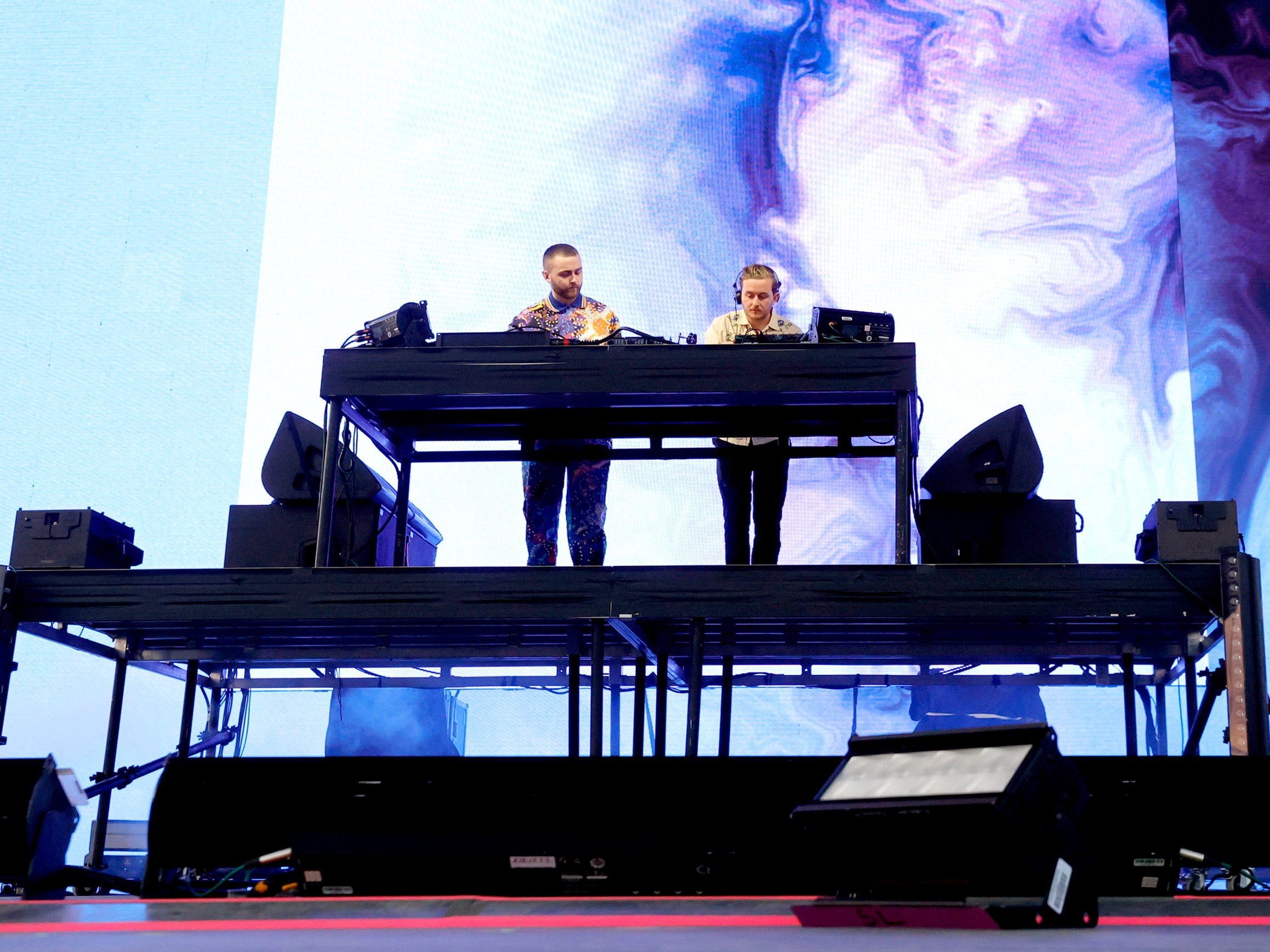 Guy Lawrence and Howard Lawrence of Disclosure perform onstage at the Outdoor Theatre during the 2022 Coachella Valley Music And Arts Festival on April 16, 2022 in Indio, California