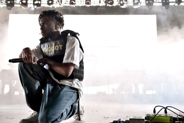 <p>BROCKHAMPTON frontman Kevin Abstract during a past Coachella show </p>