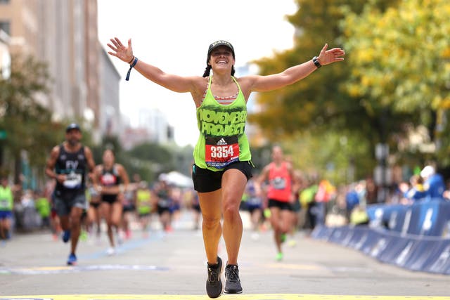 <p>Dana Bogan crosses the finish line during the 125th Boston Marathon on October 11, 2021 in Boston, Massachusetts (Photo by Maddie Meyer/Getty Images)</p>