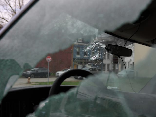 <p>Bullet holes in a van parked near the Pittsburgh Airbnb where two children were killed in a shooting on Saturday </p>