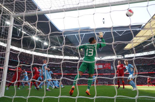 Liverpool beat Manchester City to reach the FA Cup final (Nick Potts/PA)