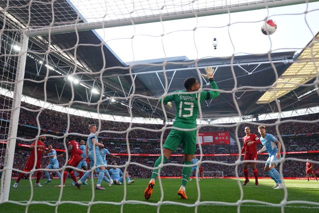 Liverpool beat Manchester City to reach the FA Cup final (Nick Potts/PA)