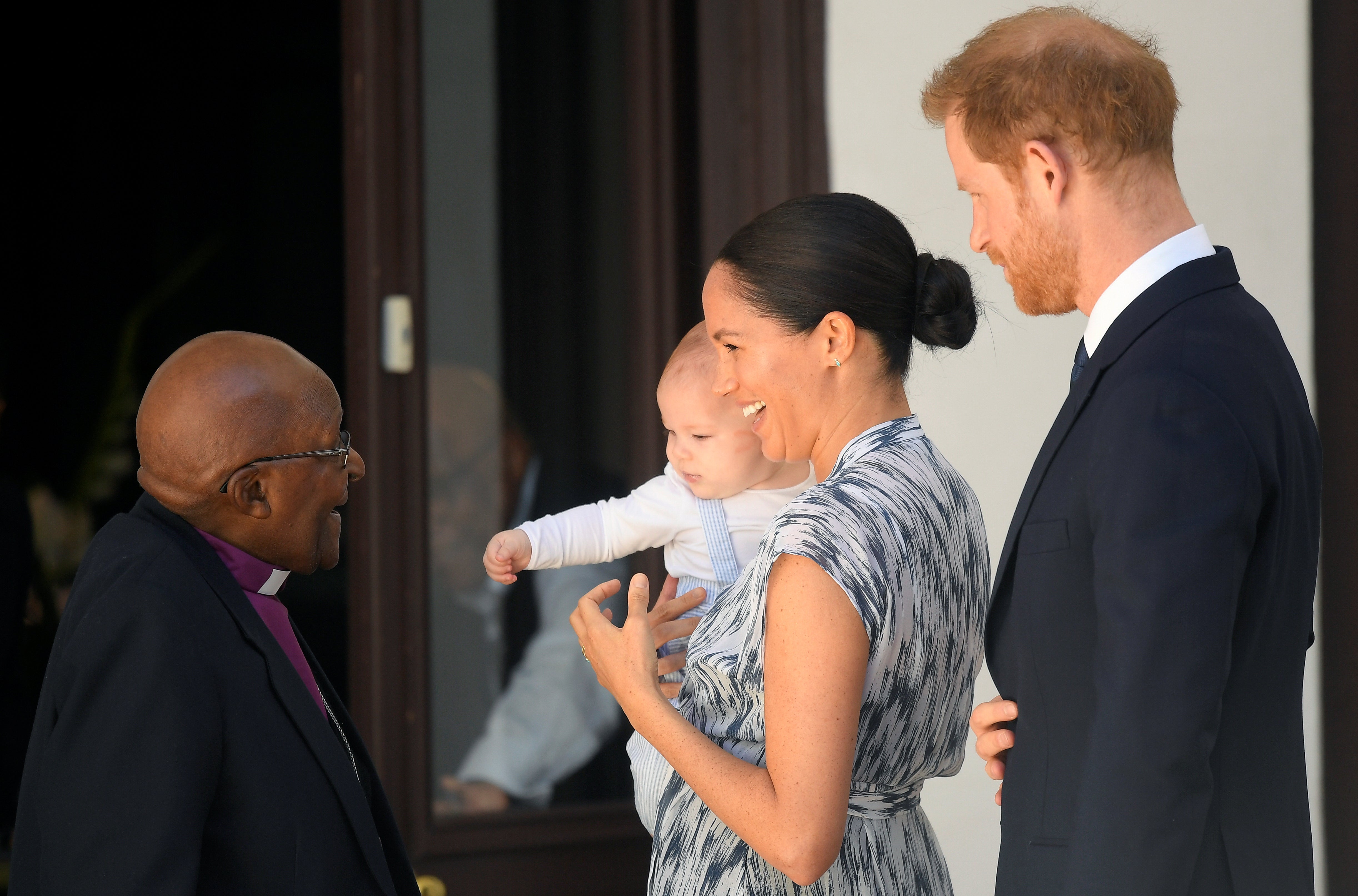 The Duke and Duchess of Sussex with their son Archie meeting Archbishop Desmond Tutu in 2019 (Toby Melville/PA)