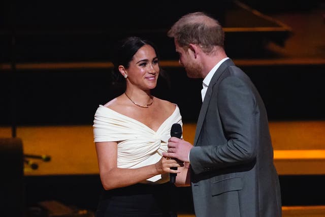 The Duke and Duchess of Sussex during the opening of the Invictus Games (Aaron Chown/PA)