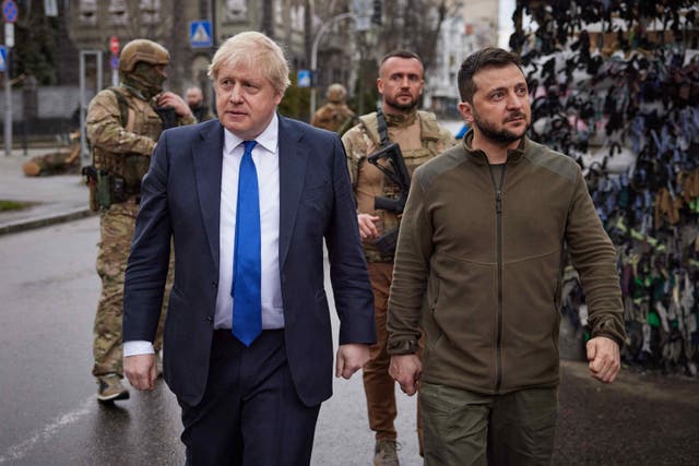 <p>Johnson walks with Ukrainian president Volodymyr Zelensky during a trip to Kyiv earlier this month </p>