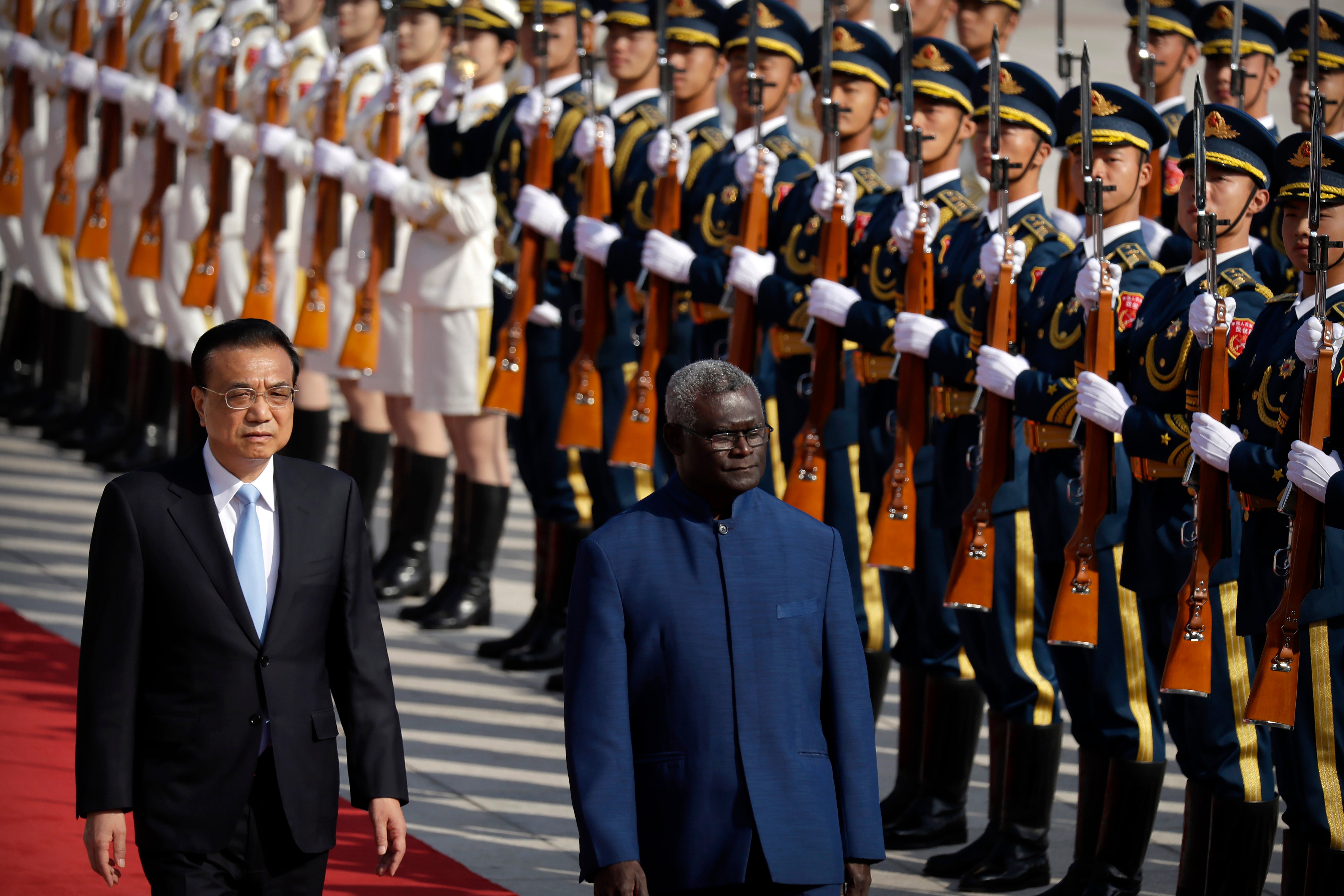 China’s Premier Li Keqiang, left, and Solomon Islands Prime Minister Manasseh Sogavare