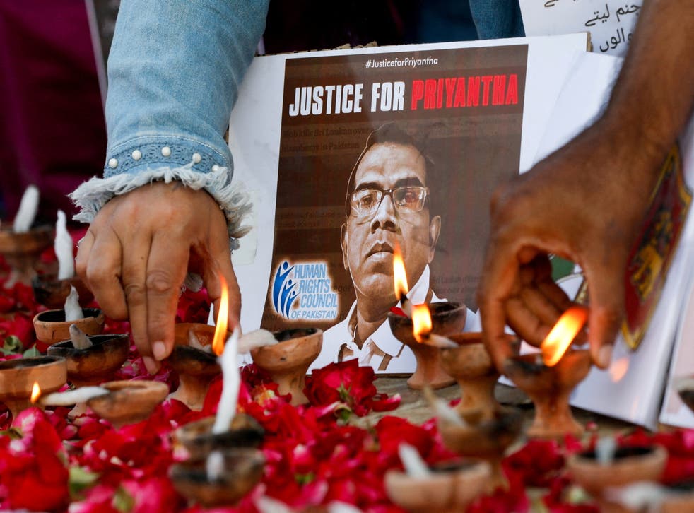 <p>File photo: People express their condolences in Karachi on 5 December 2021</p>