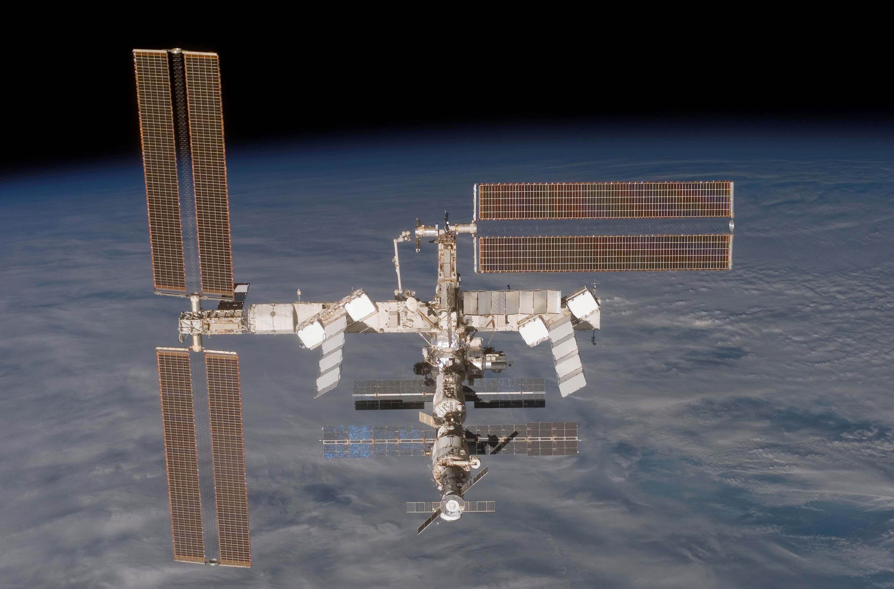 <p>In this handout from Nasa, the International Space Station is seen from the Space Shuttle Discovery </p>
