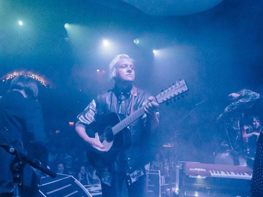 Arcade Fire had to pause their Coachella performance to help a fan who was struggling in the pit