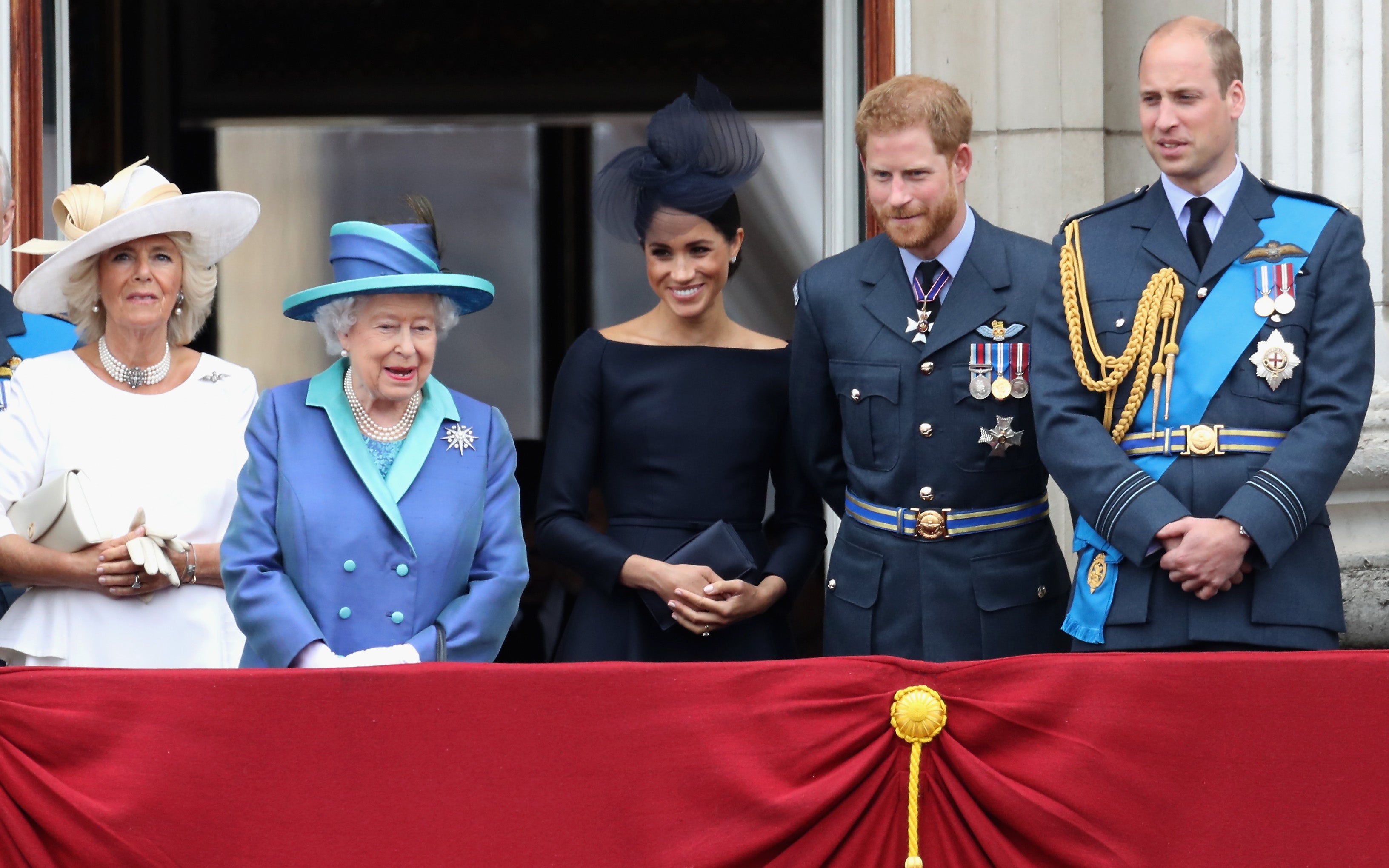 The Duchess of Cornwall, the Queen, Duke and Duchess of Sussex and Duke of Cambridge on the balcony of Buckingham Palace in July 2018