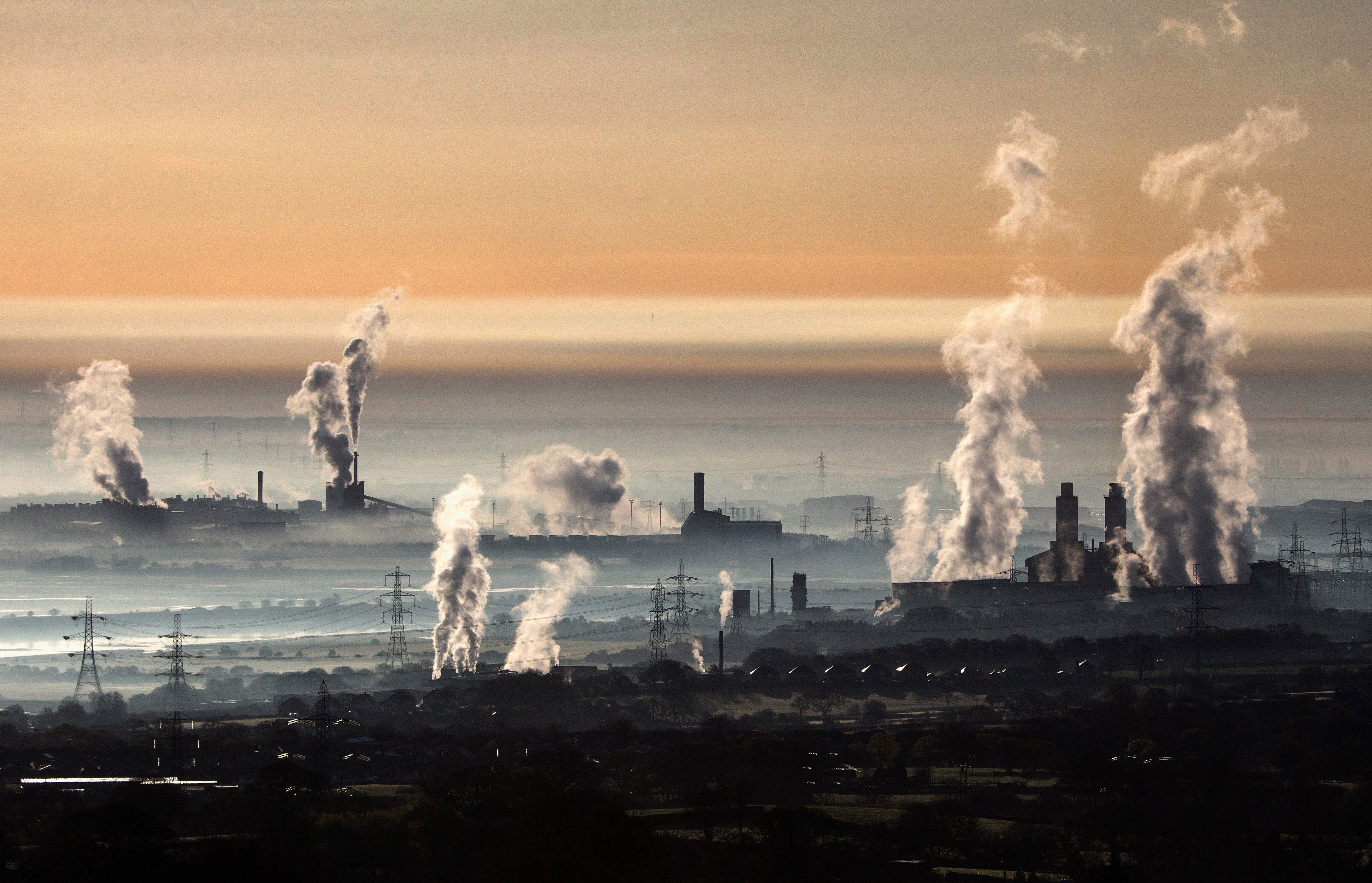 Steam rises from Deeside power station, Shotton steelworks and other heavy industrial plants in Flint