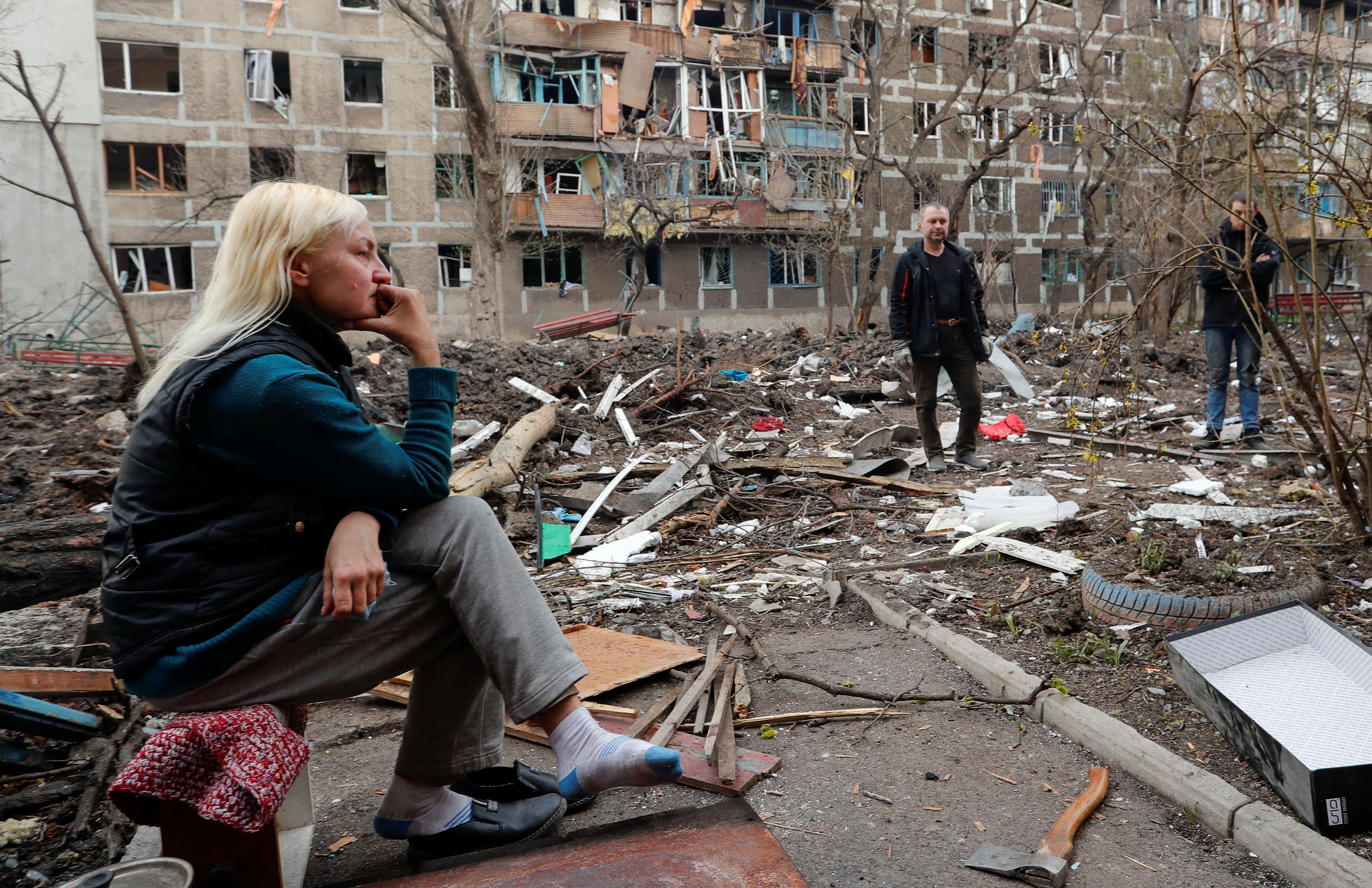 Britain promised a £220m humanitarian aid package for Ukrainians such as these residents of Mariupol