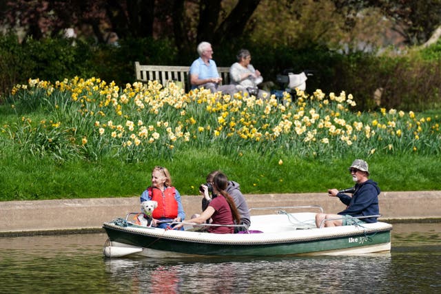 <p>People on a boat move along the river Avon by St Nicholas’ Park in Warwick last weekend </p>