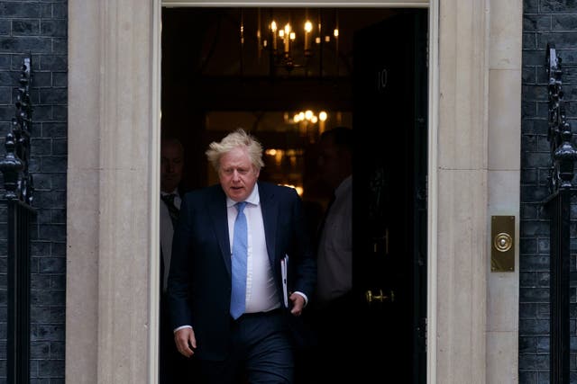Prime Minister Boris Johnson leaves 10 Downing Street, London, to head to the House of Commons to make a statement to MPs (PA)