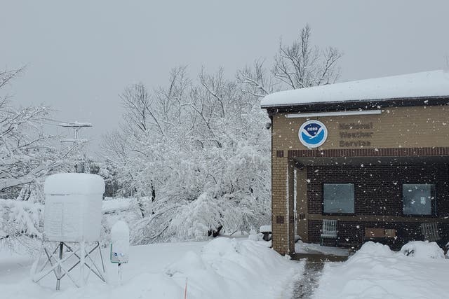 <p>Snowfall piles up at the National Weather Service in Binghamton, NY on April 19</p>